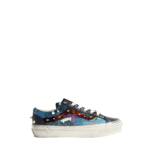 Image 1 of 3 - BLUE - Vans Unisex Premium Old Skool 36 Harris Tweed Sneakers are crafted from Harris Tweed woven from 100% virgin wool and feature the iconic low-top silhouette, lace-up closure, and contrast stitching. Designed with jewel, pin, and stud embellishments, a subtly distressed finish, and a padded collar. Main Material: Harris Tweed 100% Virgin Wool. Outsole: Rubber. *Unisex style in men's sizing.
