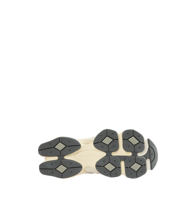 Image 4 of 5 - WHITE - New Balance 9060 Sneakers are a lace-up style with ABZORB midsole cushioning, ABZOB SBS heel cushioning, tongue logos, mesh and leather inserts, and diamond pattern outsoles.