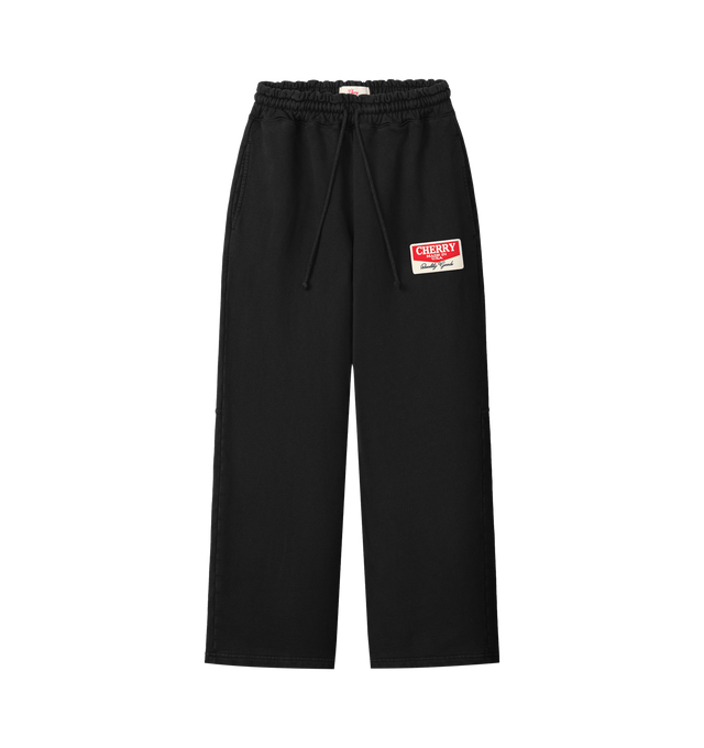 Image 1 of 6 - BLACK - Cherry LA Chevron Parachute Sweatpants are crafted from custom cotton fleece and feature a wide-leg silhouette with a relaxed, laid-back fit. Designed with a patch detail at the leg, an adjustable drawcord waistband, and a branded label at the back pocket, these everyday sweatpants blend comfort-focused construction with Cherry LA's signature contemporary aesthetic. Main Material: Custom Cotton Fleece. Made in Los Angeles, USA.