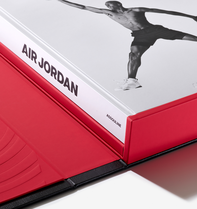 Image 16 of 20 - MULTI - Assouline celebrates 40 years of Air Jordan with a landmark Ultimate volume, created in collaboration with Michael Jordan and the Jordan Brand. This collectors piece honors the enduring influence of Michael Jordan and the brand that reshaped sport, style, business, and culture worldwide.Limited to 1,000 hand-numbered copies, the Ultimate edition is crafted with a host of bespoke details. Encased in an intricately tooled leather clamshell, the cover features Baroque-inspired embossin