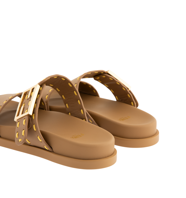 Image 3 of 4 - BROWN - FENDI Feel Slide Sandal featuring double-band flat slides with FF Baguette decorative buckle, hand-sewn contrasting macro Selleria topstitches and gold-finish metalware. 100% calfskin. Made in Italy.
