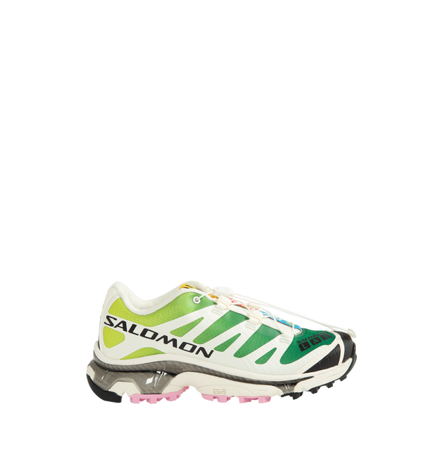 Image 1 of 5 - GREEN - Salomon XT-4 OG Sneakers are crafted from synthetic and textile materials and feature the iconic XT-4 silhouette revived from the archives. Celebrated for its vintage aesthetic, long-lasting comfort, and stable performance, this legendary trail-inspired design returns with refreshed colorways while staying true to the style and functionality that made it a cultural icon. Main Material: Synthetic and Textile Upper. Lining: Textile. Insole: Textile. Outsole: Rubber. Closure: Quicklace S
