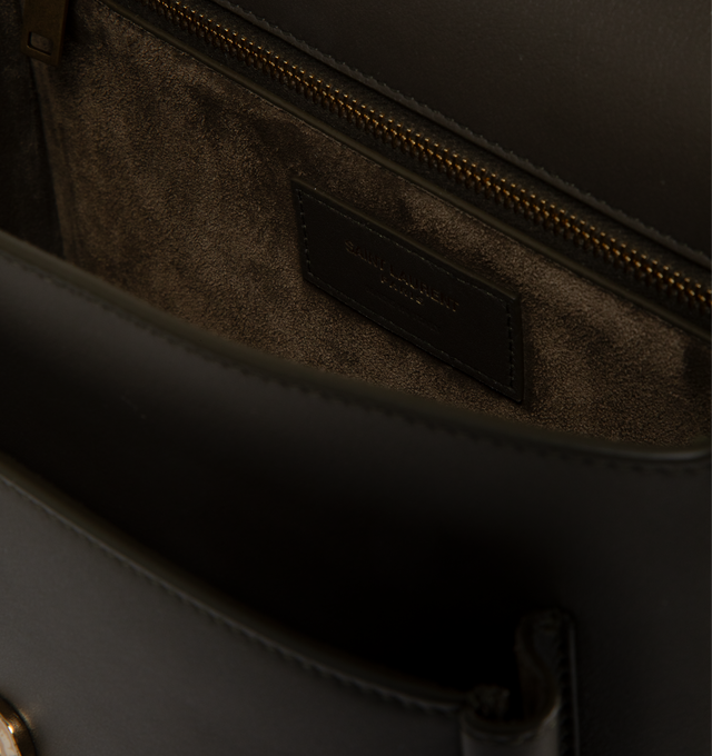 Image 3 of 3 - BROWN - Saint Laurent Niki satchel crafted from finely grained leather, fully lined in tonal leather. Featuring two compartments, an adjustable strap for bespoke carry options., bronze-toned hardware, magnetic closure, and one zip pocket. Measures 8.5 inches wide x 6.3 inches high x 3.1 inches deep with 18.5 inch strap drop. Made in Italy.