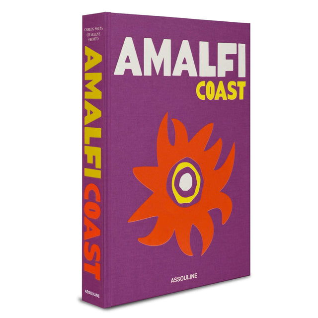 Image 1 of 1 - PURPLE - ASSOULINE Amalfi Coast Book by Carlos Souza and Charlene Shorto. Linen hardcover book with 296 pages and over 200 illustrations. Approx. 9.8"W x 13"L x 1.5"D. Made in Italy.