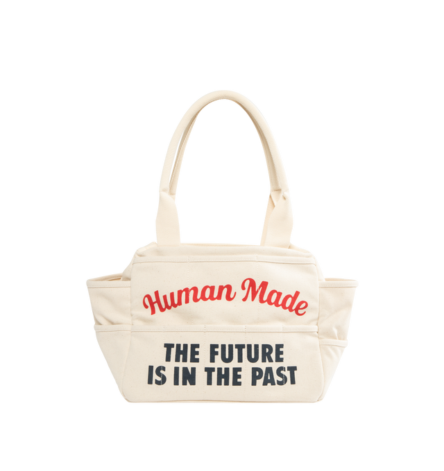 Image 1 of 3 - WHITE - HUMAN MADE Tool Bag featuring multi-pockets, made from thick, tough 18oz cotton canvas, convenient diagonal pockets below the heart patch, snap buttons for adjusting the gussets, handle also allows for shoulder carrying, graphics on both sides, Heart patch, heart name tag on the inside and A4-sized storage. 100% cotton.