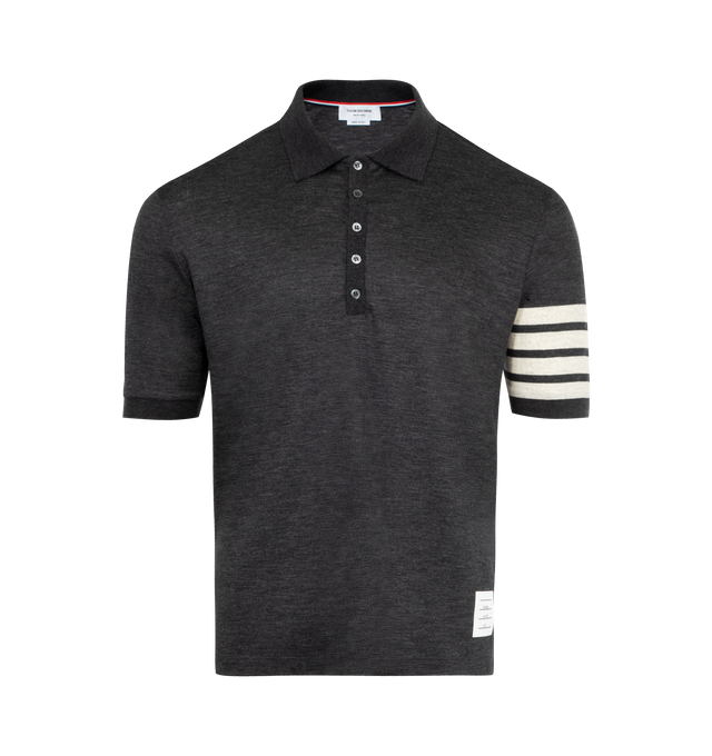 Image 1 of 3 - GREY - THOM BROWNE Wool Jersey 4-Bar Polo featuring partial front button closure, 4-bar detailing, name tag applique, buttoned side vents with signature striped grosgrain trim and signature striped grosgrain loop tab. 100% virgin wool. Made in Italy.