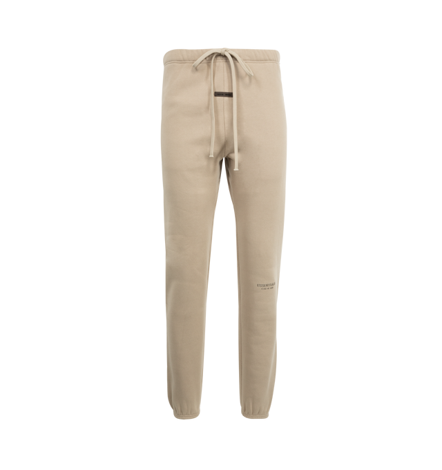 Image 1 of 3 - BROWN - FEAR OF GOD Vintage Sweatpant featuring an encased elastic waistband and bottom hem, elongated drawstrings, side seam pockets and front center translucent rubberized label. 80% cotton, 20% polyester fleece.
