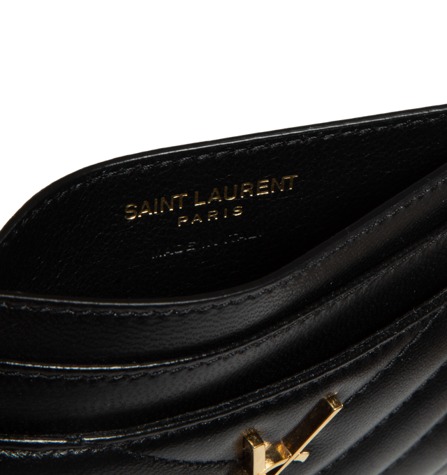 Image 3 of 3 - BLACK - SAINT LAURENT Monogram Card Case featuring five card slots, gold tone hardware, cassandre and chevron-quilted overstitching. 4 X 2.8 X 0.1 inches. 100% lambskin. Made in Italy.  