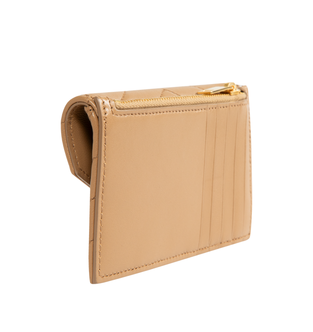 Image 2 of 3 - BROWN - SAINT LAURENT Zip Card Case with flap in soft nappa leather, decorated with the CASSANDRE and chevron-quilted topstitching, leather lining, gold-toned hardware, snap-button closure, one zip coin pocket and five card slots. 5.1" x 3.1" x 0.7". Calfskin leather. Made in Italy.