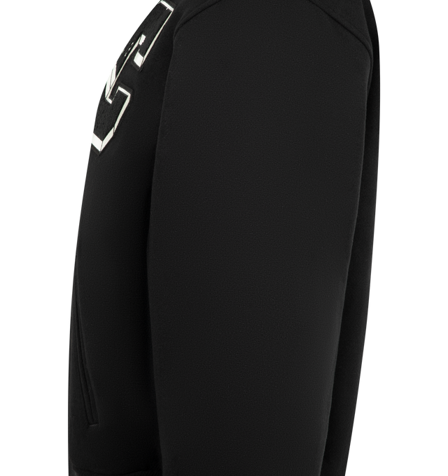 Image 3 of 4 - BLACK - CARHARTT World Class Varsity Jacket featuring nylon diamond quilted lined, rib-knit cuffs and bottom band, two front piped pockets, graphic embroidery and patches, inside chest pocket and front closure with personalized snaps. 70% polyester, 30% wool.