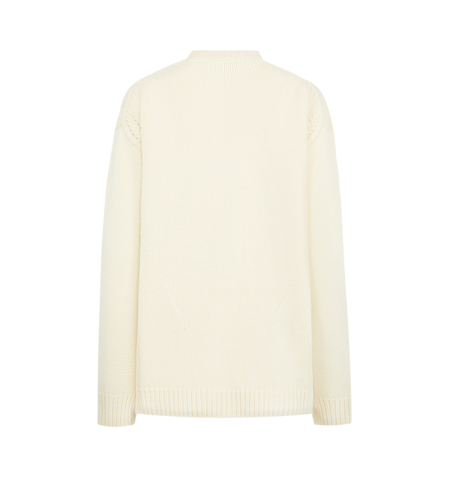 Image 2 of 3 - WHITE - MONCLER Wool & Cashmere V-Neck Cardigan featuring a wool and cashmere blend, stockinette stitch and cable knit, gauge 5, v-neck, snap button closure, front pockets and leather logo patch. 90% virgin wool, 10% cashmere. Made in Italy.