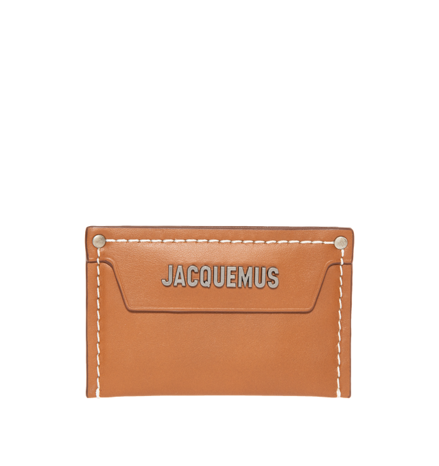 Image 1 of 3 - BROWN - JACQUEMUS Le porte carte Meunier featuring logo plaque at face, two card slots at back face, cotton twill lining and contrast stitching. H3 x W4.5 in. 100% leather. Made in Spain. 