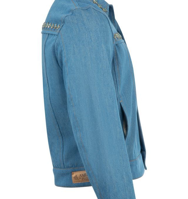 Image 3 of 3 - BLUE - AMIRI Pleated Crystal Denim Cadet Jacket featuring medium-wash denim, crystal-embellished trims, yoked shoulders, spread collar, button closure, pleated front and long sleeves with buttoned cuffs. 100% cotton. Made in Italy.