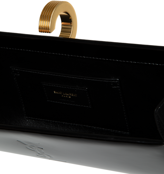 Image 3 of 3 - BLACK - SAINT LAURENT Daria Minaudiere in Brushed Leather featuring hinged clutch case decorated with metal ring closure, lambskin lining and one flap pocket. 10.2 X 4.3 X 0.41.2 inches. 90% calfskin, 10% metal. 