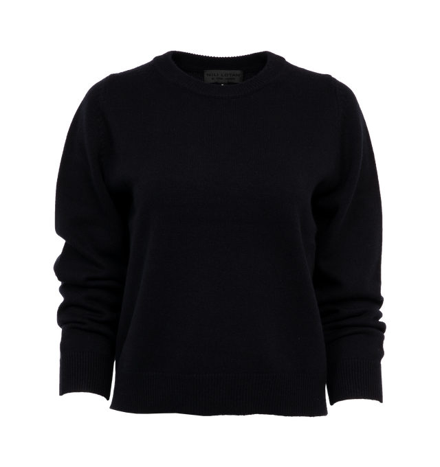 Image 1 of 3 - NAVY - NILI LOTAN NORA SWEATER featuring Light to medium weight, straight fit, set in sleeve, double layer rib neck cuff, fully fashioned along sleeve, body, and shoulder, wristlet sleeve length and signature center back cableknit detail. 100% cashmere.  