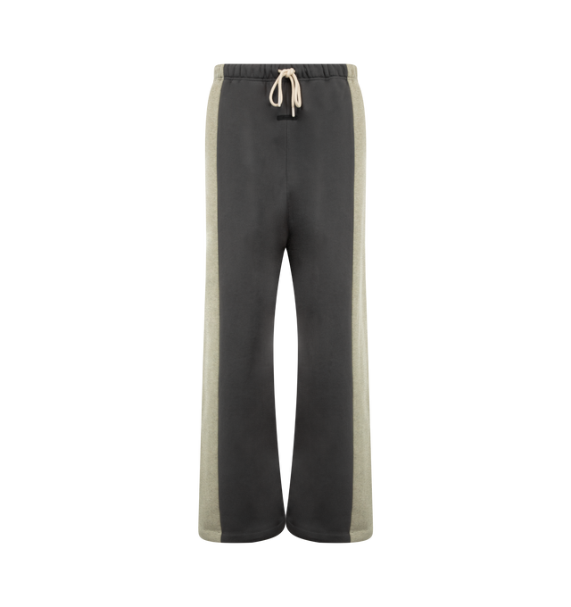 Image 1 of 3 - GREY - Fear of God Essentials Mens Lounge Pants are crafted from heavyweight 380 GSM cotton-blend core fleece. Feature a wide-leg fit, paneled construction, elasticized waistband with bungee drawcord, side-seam pockets, and an Essentials logo label. Main Material: 80% Cotton, 20% Polyester.