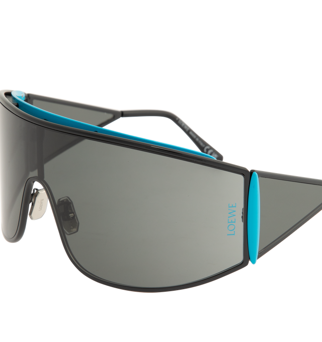 Image 3 of 3 - BLACK - LOEWE Speed Shield Sunglasses featuring shield-shape in a wraparound metal construction with a lens that extends into a distinctive triangle-shaped temple, complemented by contrast trim, universal fit, UVA/UVB protection and engraved LOEWE. Metal. Temple size: 12 cm. Made in Italy.