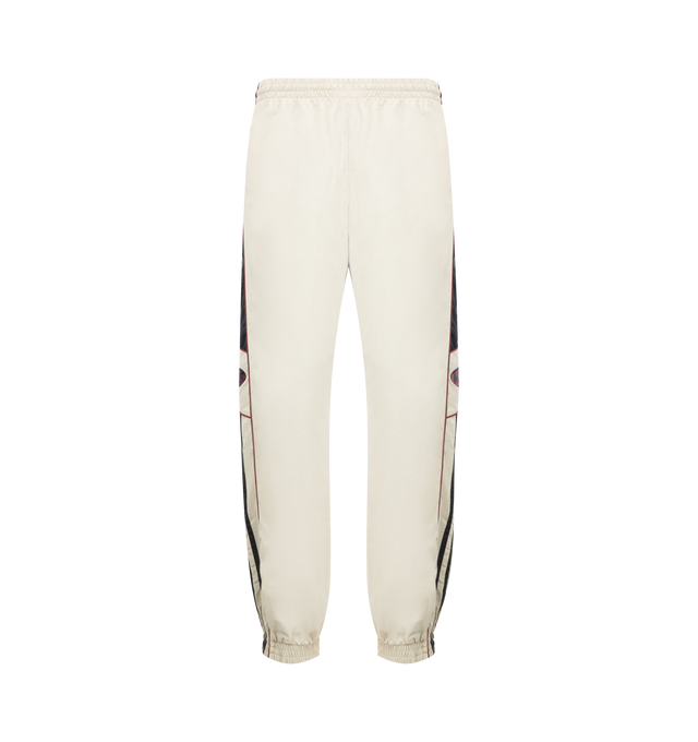 Image 1 of 3 - WHITE - MARTINE ROSE Hockey Trackpants featuring side stripe detailing, logo print, elasticated ankles, side pockets, panelled design and elasticated waistband. 100% polyamide.