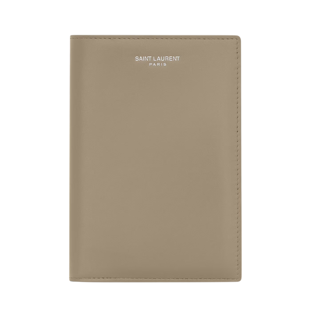 Image 1 of 3 - BROWN - SAINT LAURENT Passport Case in smooth leather featuring passport cover with internal card slots, decorated with signature, silver-tone hardware, two passport inserts and four card slots. 3.9" x 5.5" x 0.6". Calfskin. Made in Italy.