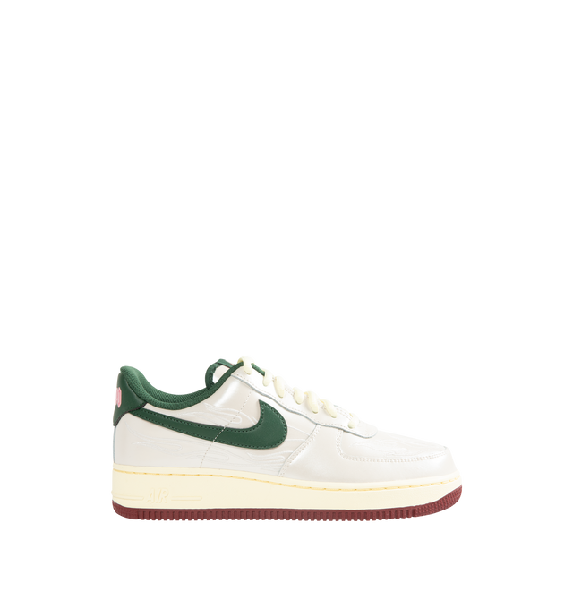 Image 1 of 5 - WHITE - NIKE Air Force 1 '07 LV8 Sneaker featuring classic silhouette with genuine and synthetic leather upper with perforated toe box, Nike Air unit, rubber outsole with classic pivot circles and padded collar.