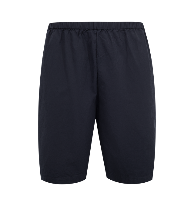 Image 1 of 3 - NAVY - THE ROW Zindel Short featuring relaxed pull-on short in washed Japanese cotton with gathered elastic waistband, side seam pockets, and above-the-knee length. 100% cotton. Made in Italy.