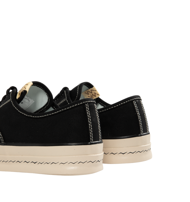 Image 3 of 5 - BLACK - VISVIM Logan Deck Lo Sipe Sneaker featuring Japanese high twist cotton canvas upper, rubber outsole, pigment free leather lining and cork insole for enhanced cushioning and moisture absorption.