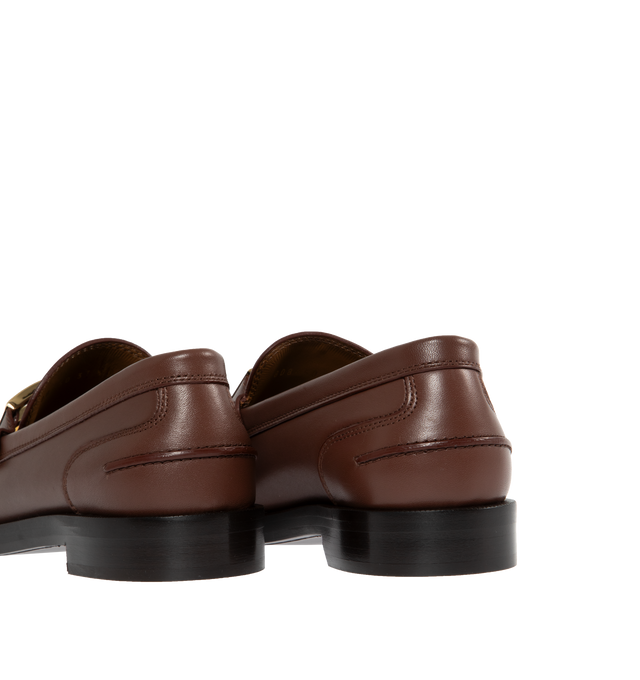 Image 3 of 4 - BROWN - Fendi Loafers with visible stitched apron and vamp embellished with FF motif. Made of 100% calf leather. Gold-finish metalware. Rubber sole. 25mm heel. Made in Italy. 