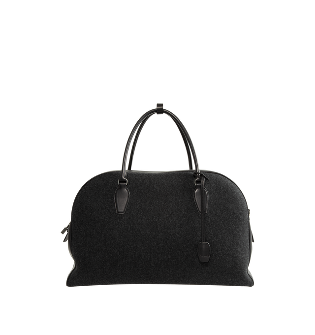 Image 1 of 3 - BLACK - The Row India Travel Bag is crafted from heavyweight felted wool and features a structured travel silhouette with tubular leather handles, smooth calfskin trim, and a zip-top closure. Designed to balance tactile warmth with polished sophistication, this elevated carryall is finished with a branded metal padlock and key, while the compact felted wool construction showcases a subtle mlange texture unique to natural materials. Main Material: 80% Virgin Wool, 20% Calfskin Leather. Lining:
