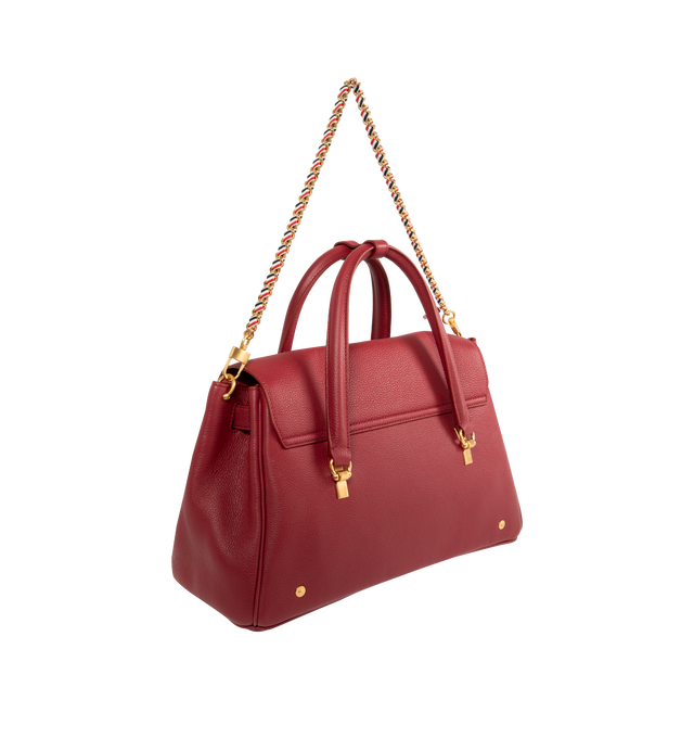 Image 3 of 4 - RED - THOM BROWNE Bolton Bag featuring padlock flap closure, top handles, key bell with RWB grosgrain trim, detachable adjustable leather shoulder strap, detachable RWB ribbon-woven chain strap, RWB stripe on front and back, adjustable side gussets with belt and stud details, interior zip pocket, slip pocket, and two smaller slip pockets, tricolor lining and signature striped grosgrain loop tab. L 33 x W 15 x H 35 cm. 100% calf full grain leather. Lining: 100% polyester. Made in Italy.