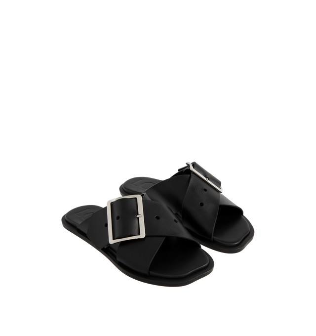 Image 3 of 4 - BLACK - Loewe Petal Belt flat sandal in vegetable-tanned calfskin featuring a criss-cross upper recalling a belt and the signature square buckle, 20mm Campo kitten heel, engraved LOEWE on the buckle, padded leather insole, and rubber island injected in the leather outsole for better grip. Made in Italy.