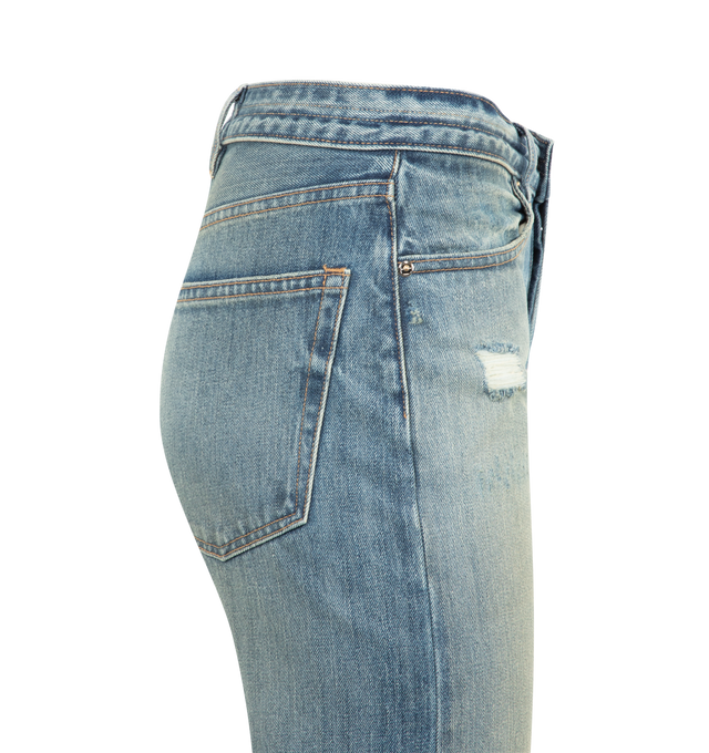 Image 3 of 3 - BLUE - RUADH The Agnes Jean featuring a mid rise, hitting just below the true waist. The silhouette is sleek and elongating with a slim straight profile, realized in a vintage destroy wash. This fabric is constructed with part regenerative cotton and part recycled cotton and is a mid weight rigid (no stretch). Classic 5 pocket detailing with RADH signature triple beltloops at back waist and semi-precious gold hardware. Shank and fly closure. This jean was designed to fit tightly through the w