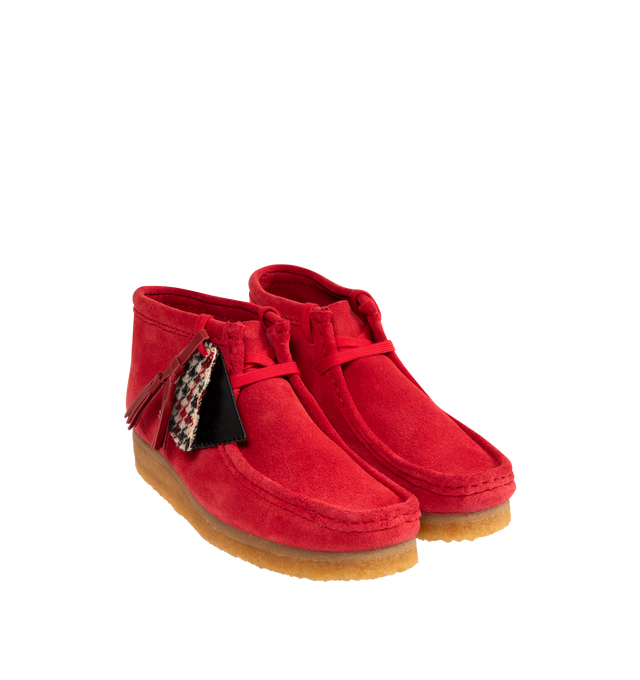 Image 2 of 4 - RED - CLARKS Wallabee Boot featuring a rich red suede upper with hand-stitched apron seams, classic moccasin construction, two exclusive FOBs, amber pebble crepe sole, woven sock label and red tassels.