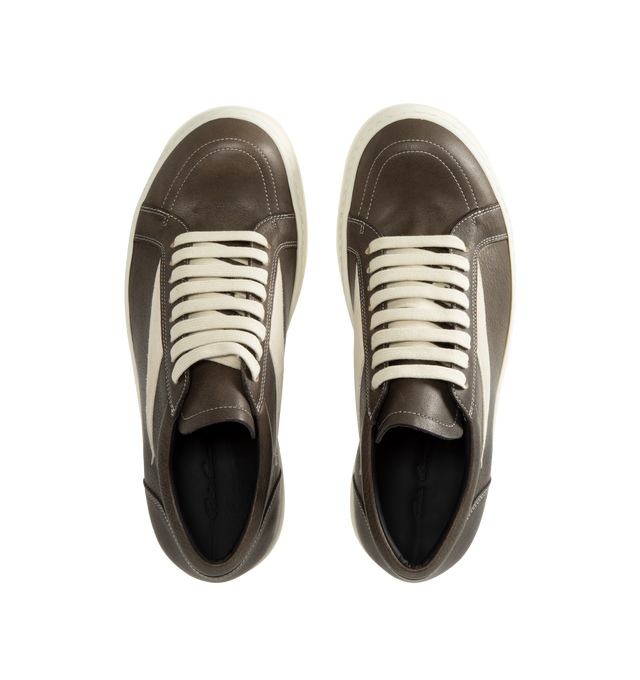 Image 5 of 5 - BLACK - Rick Owens Vintage Sneaks are designed with a low-top design including a lace-up closure, signature shark-tooth soles, and contrast stitching. Upper: 100% Cotton. Lateral Details: 100% Calf Leather. Lining: 100% Cotton. Sole: 100% Thermoplastic Rubber. Sole Height: 3.5 cm / 1.4 in. Closure: Lace-Up. Made in Italy.