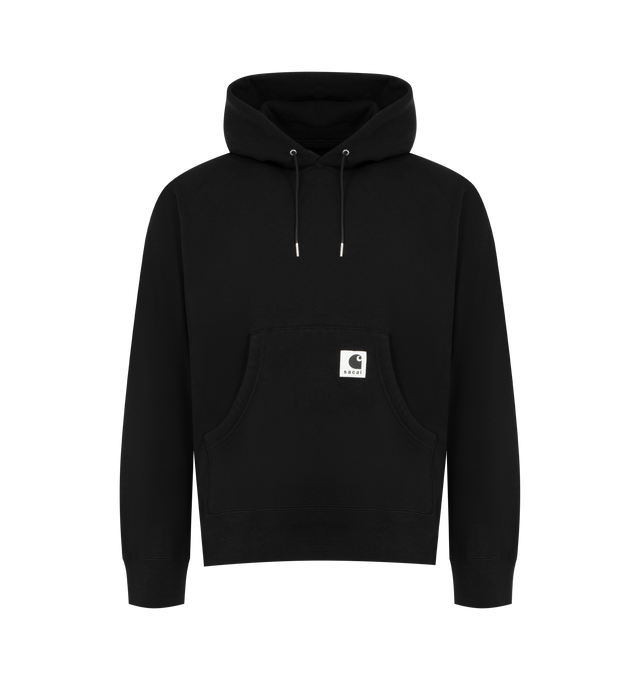 Image 1 of 3 - BLACK - SACAI X CARHARTT WIP Cotton Hoodie featuring a heavyweight cotton jersey fabric with a soft, brushed cotton pile lining, garment-washed for a unique, worn-in appearance, hooded drawstring neckline, kangaroo pocket with co-branded woven label, long sleeves, ribbed cuffs and hem and pullover style. Cotton/polyurethane. Made in Japan.