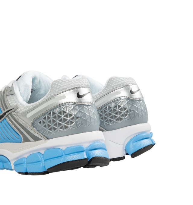 Image 3 of 5 - BLUE - NIKE Zoom Vomero 5 Sneaker featuring synthetic leather on the upper, mesh panels and ventilation ports on the heel, snappy and responsive, Zoom Air cushioning, plastic caging on the side, rubber outsole and reflective details.