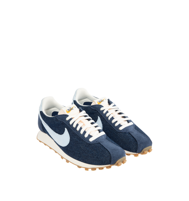 Image 2 of 5 - NAVY - NIKE LD-1000 Sneaker featuring dramatically flared heel, upper combines leather and textiles, waffle outsole, foam midsole and rubber outsole.