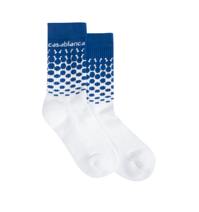 Image 1 of 2 - BLUE - CASABLANCA Beyond Destiny Gradient Socks featuring halftone pattern, rib legs and a contrast Casablanca logo on the cuffs. 87% recycled cotton 12% polyamide 1% elastane. Made in Portugal.
