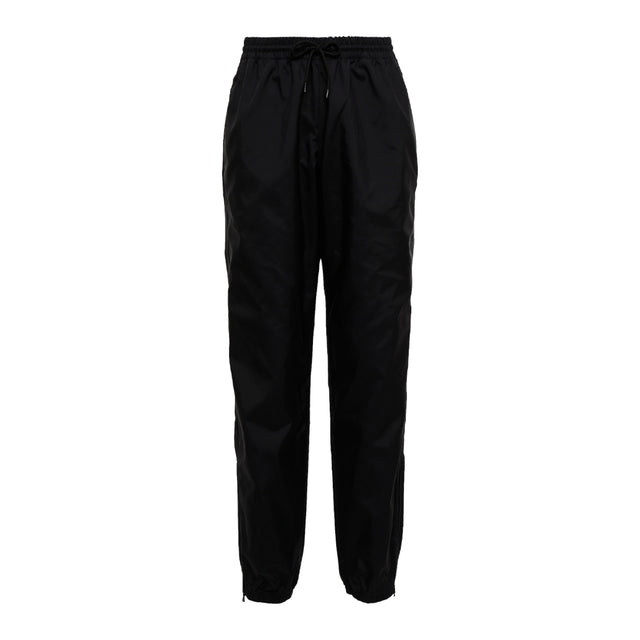 Image 1 of 2 - BLACK - WARDROBE.NYC Utility Pants have an elastic drawstring waist, side seam pockets, and elastic zip ankle cuffs. 100% nylon. Made in Portugal.  
