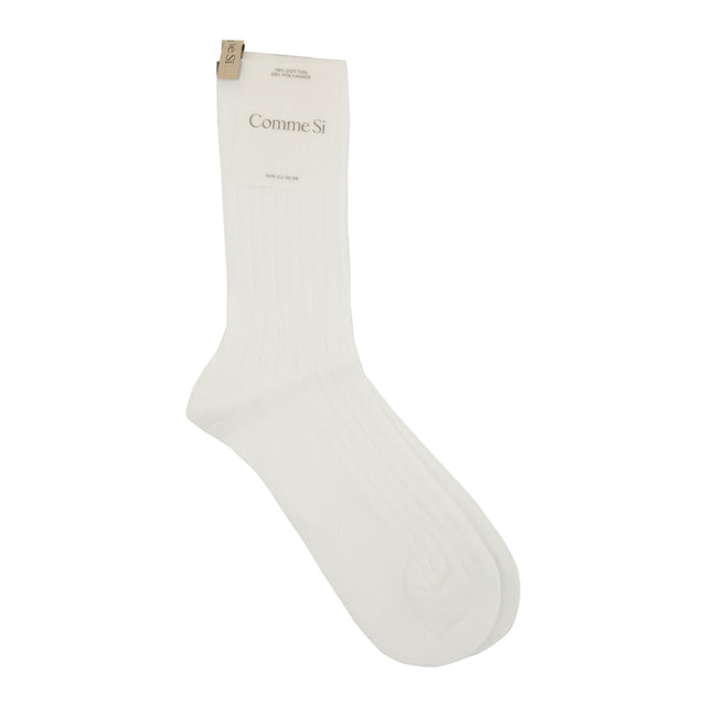 Image 1 of 1 - WHITE - COMMES Si The Yves Socks have a wide rib, reinforced toe, and decorative logo ribbon. 78% cotton and 22% polyamide. Made in Italy.
