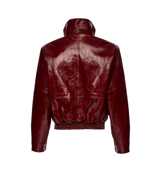 Image 2 of 2 - RED - Magda Butrym oversized patent leather bomber jacket featuring sloping shoulders, a cinched elastic waistband, zip and button closures, and oversized front flap pockets. Shell 100% Sheep Leather. Lining 100% Viscose. Made in France. 