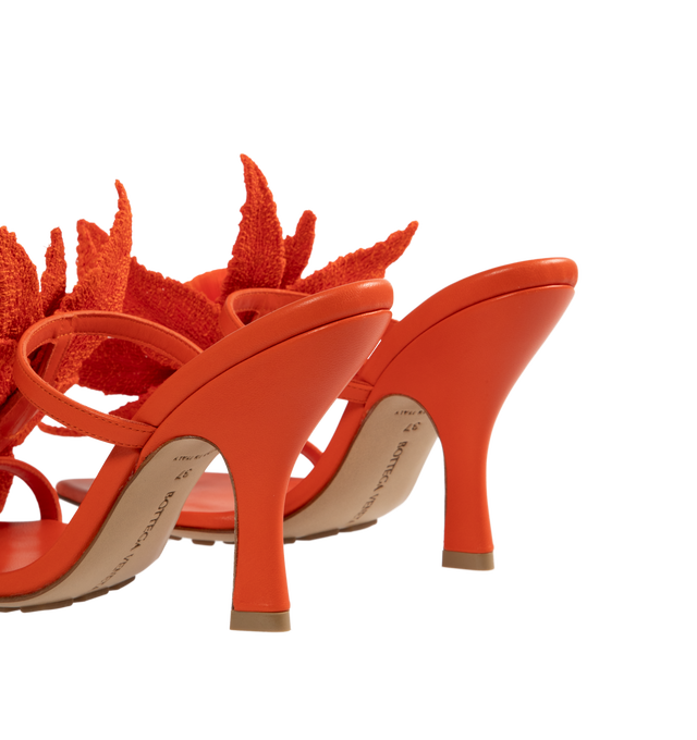 Image 3 of 4 - ORANGE - BOTTEGA VENETA Adam Sandal featuring leather mule sandal with raffia flower embroidery and rubber-injected leather outsole. Lambskin, raffia. Heel: 3.5. Made in Italy. 