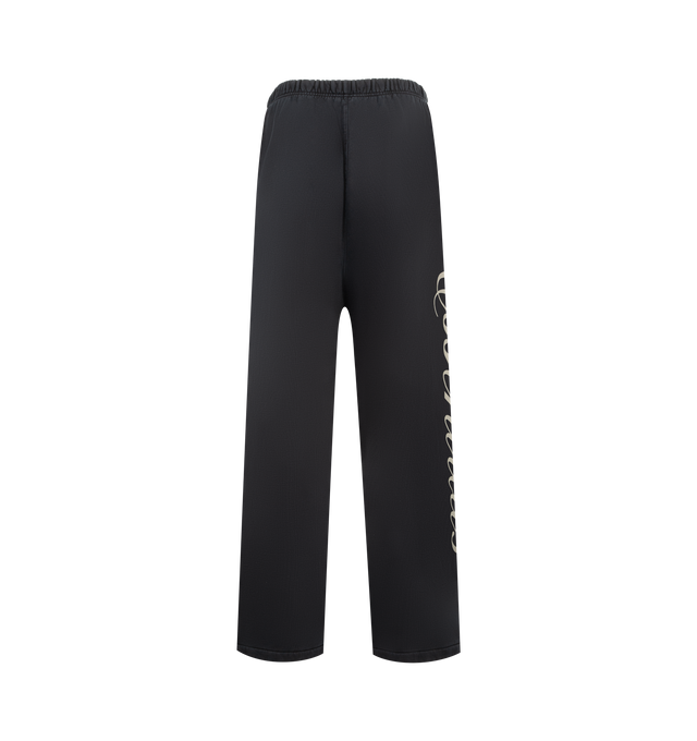 Image 2 of 4 - BLACK - FEAR OF GOD ESSENTIALS Heavy Fleece Lounge Sweatpant featuring 520gsm heavy fleece treated with a pigment dye, wide-leg silhouette, bold Essentials script logo on the leg, encased elastic waistband with elongated drawcords, side seam pockets and a Fear of God Essentials rubberized label stitched at the center front. 100% cotton. 