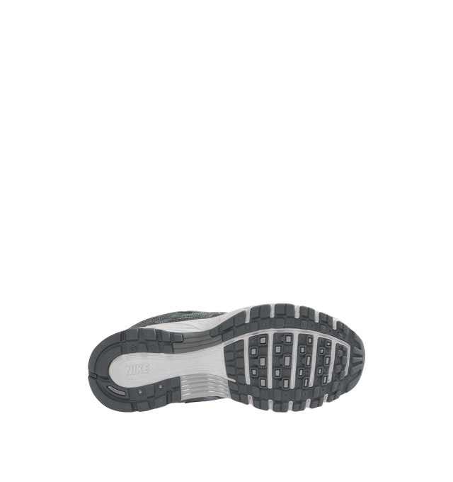 Image 4 of 5 - GREY - Nike P-6000 Sneaker featuring breathable mesh has real and synthetic leather overlays, foam midsole provides lightweight cushioning for a plush underfoot feel, no-slip grip and full rubber outsole. 