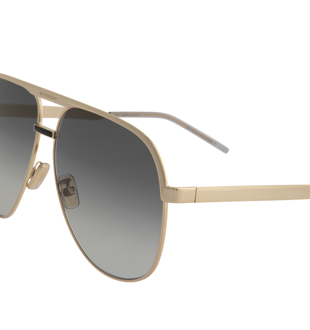 Image 3 of 3 - GOLD - GIVENCHY Aviator Metal Sunglasses featuring solid lenses, adjustable nose pads, logo engraved brow bar and thin, tapered arms. Metal. 100% UVA/UVB protection. Made in Italy. 
