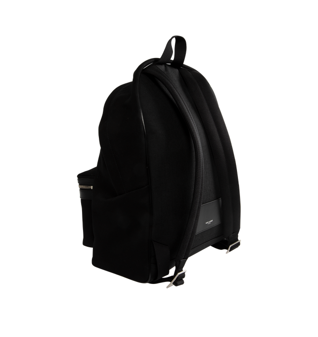 Image 2 of 3 - BLACK - Saint Laurent embroidered city backpack in canvas with Saint Laurent signature embossed exterior zip pocket, zip compartment and padded slot pocket, double zip closure, oxidized nickel hardware, adjustable padded straps, top handle with removable leather strap with saint laurent signature engraved metal plaque. Dimensions: 12.2 x 16.1 x 8.6 INCHES. COTTON. Made in Italy 