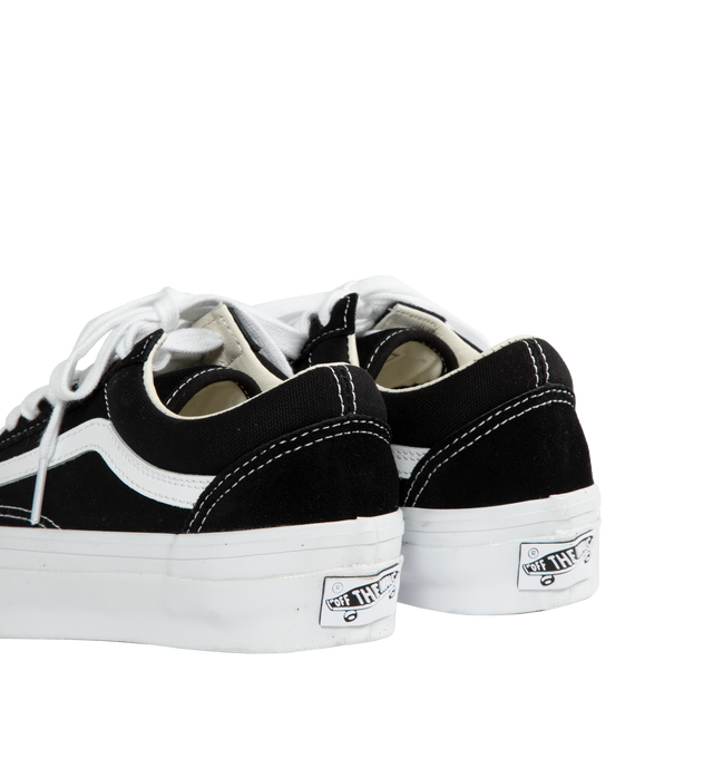 Image 3 of 5 - BLACK - VANS Old Skool 36 Sneaker featuring lace up, padded collar, classic style with shorter vamp, lower collar around the ankle and higher collar above the heel, logo detailing at heel and footbed, side stripe and contrast stitching. Leather upper, polyester/leather lining, rubber sole. 