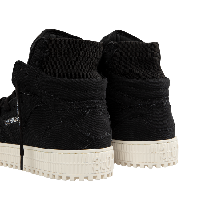 Image 3 of 5 - BLACK - OFF-WHITE 3.0 Off Court Denim Sneakers featuring high-top sneakers, flat heel, perforated round toe, lace-up vamp, logo patches at tongue and vamp, zip-tie hangs from side, textured midsole and vulcanized rubber sole. 