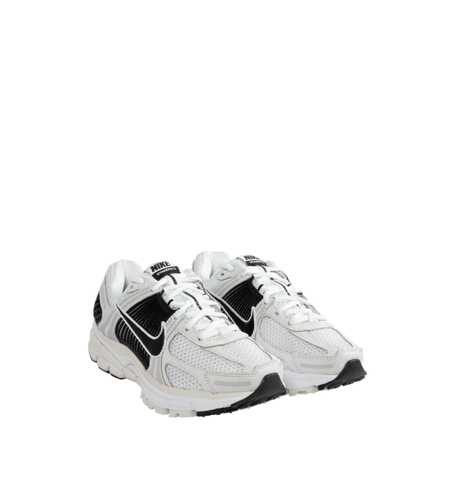 Image 2 of 5 - WHITE - NIKE ZOOM VOMERO 5 fearures Mesh with TecTuff and utilitarian overlays that are breathable and durable, cushlon foam with Zoom Air cushioning and rubber tread. 