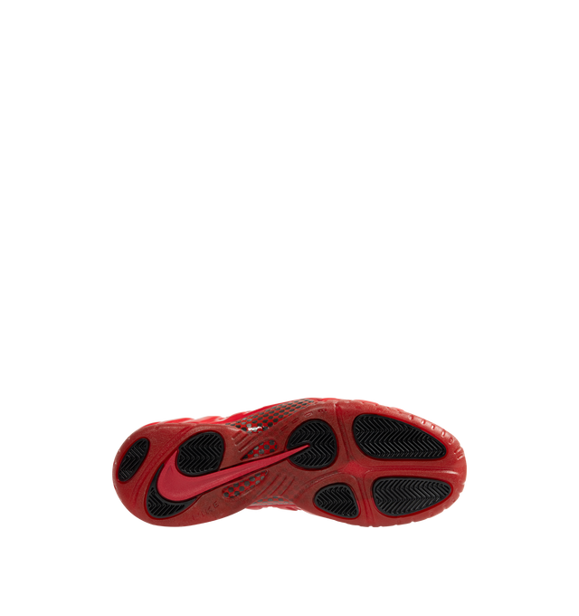 Image 4 of 5 - RED - NIKE Air Foamposite Pro Sneaker featuring Foamposite upper that molds to your foot, full-length and heel Zoom Air cushioning, foam midsole and rubber outsole with herringbone tread. 