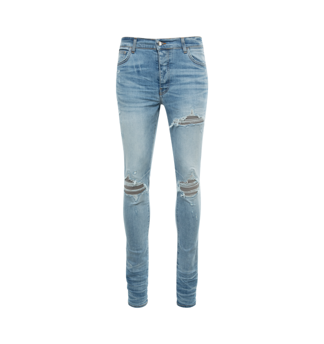 Image 1 of 2 - BLUE - AMIRI MX1 Jeans featuring skinny-fit stretch denim, fading, whiskering, and subtle distressing throughout, belt loops, five-pocket styling, button-fly, underlay at front and logo-engraved silver-tone hardware. 92% cotton, 6% elastomultiester, 2% elastane. Made in United States. 